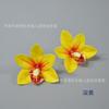 Flor de Orquídea Cymbidium Simulada Produto Mais Vendido Transfronteiriço Decoração de Mesa de Sobremesas para Confeitaria Produção de Adorno de Cabeça Étnico