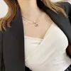 Collar de Doble Capa con Estrella Hueca para Mujer Estilo Ins Diseño de Nicho Estrella de Cinco Puntas Hueso Simple Versátil Cadena para Clavícula Personalizada