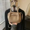 Bolsa Balde Retrô de Design de Nicho Coreano Transfronteiriça 2026 Nova Super Popular Mais Vendida Bolsa Pequena Transversal Texturizada