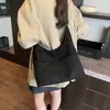 Bolsa feminina grande de couro fosco retrô, nova bolsa de ombro única para mãe e filha outono/inverno 2026, bolsa tote texturizada para trabalho e deslocamento