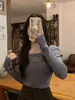 Tejido de hilo de núcleo Diseño consciente top de punto de un hombro para mujer, capa base de primavera y otoño, suéter para llevar debajo, top de nicho
