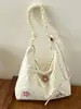 Coleção nova de 2026: bolsa tote chique e fresca com um laço, perfeita para o trabalho, o trajeto e a escola; bolsa de ombro estilosa e única
