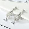 Pendientes de plumas para mujer, estilo coreano, Corea del Sur, plata s925, aguja, outina, popular fábrica de joyería para las orejas en línea, venta al por mayor