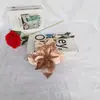 En stock suministro 22cm polvo dorado flor de Navidad flor de simulación regalo navideño colgante para árbol de Navidad guirnalda de flores decorativa accesorios