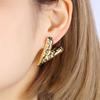 Accesorios Yiwu transfronterizos aretes geométricos líquidos retro europeos y americanos de oro de 18 quilates de acero inoxidable aretes de alta gama para mujer al por mayor