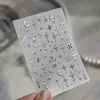 Nuevas Calcomanías para Uñas 3D Estilo Punk de Metal Plateado Cruz de Cometa Chica Atrevida Impermeables con Adhesivo