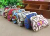 Bolsa de monedas pequeña linda coreana para mujer, lona, búho de dibujos animados, bolsa de monedas para niños, billetera pequeña Yiwu al por mayor