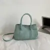 Bolso de Mano de Diseño de Moda de Nicho para Mujer 2026 Nuevo Estilo Coreano Bolso Cubo para Viajes Diarios Bolso de Hombro Único Cruzado Transfronterizo