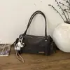 Bolsa Boston Acolchoada Retrô Desgastada da Moda Feminina Casual de Grande Capacidade com Alça Única Bolsa Transversal Versátil de Nicho para Mulheres