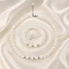 Accesorios de moda europeos y americanos populares transfronterizos, collar y pendientes de perlas vintage de nicho, juego de collar elegante estilo lujo ligero
