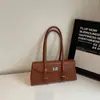 Bolso de axila de nicho de comercio exterior de alta calidad para mujer, nuevo bolso de hombro retro de moda 2026, bolso de mano versátil