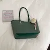 Bolso grande de mujer, moderno y sencillo, modelo nuevo 2026, bolso de hombro para el trabajo, bolso de mano de alta gama, bolso tote, bolso tipo cubo