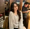 Actualización de talla de envío Otoño chic coreano nuevo estilo ins cuello en V grande de rayas temperamento top de punto de manga larga