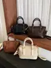 2026 Nova Bolsa de Mão de Outono Feminina Retrô Tecida Ombro Único Transversal Grande Capacidade Bolsa Almofada para o Dia a Dia