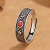 Abanico literario de apertura hecho a mano con patrón Xiangyun incrustado en anillo de ágata rojo del sur patrón étnico auspicioso retro anillo de comida