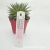Nuestra Empresa se Especializa en la Fabricación de Termómetros para Invernadero Doméstico con Diseño de una Sola Pieza de Plástico para la Medición Precisa de la Temperatura Interior y Exterior