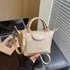 Primavera 2026 Nuevo Estilo Coreano Casual Nicho Bolso de Mano de Alta Gama Bolso Cruzado para Mujer Versátil Simple Moda Bolso de Hombro