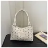Nueva bolsa de mano grande de lona ligera transfronteriza, bolso de mujer moderno plisado, bolso de hombro, bolso de mano versátil para el trabajo