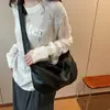 Bolso de mujer de gran capacidad, nuevo estilo 2026, bolso de axila retro de nicho, bolso de hombro cruzado versátil de alta gama