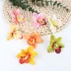6cm Cabeça de Orquídea Cymbidium Artificial Acessórios de Toque Grampo Lembrança de Casamento Layout de Fundo DIY Arranjo de Flores Fabricante Atacado