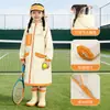 Impermeable infantil, diseño de dibujos animados en EVA, adecuado para estudiantes de primaria, con compartimento para mochila, diseñado para uso escolar y totalmente impermeable