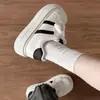 Zapatos de Estilo Universitario Coreano para Aumentar la Altura con Suela Gruesa para Mujer 2026 Nuevas Zapatillas Blancas de Caña Baja para Primavera Zapatos de Estudiante Zapatos de Pan