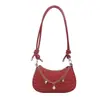Onda de comércio exterior transfronteiriça texturizada 2026 simples e moderna elegante bolsa de ombro com corrente de bolinho para mulheres