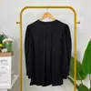Tela plisada transfronteriza Nuevo artículo Camisa chaqueta holgada de color liso manga larga para mujer Camisa holgada para mujer Top para mujer TIKTOK