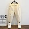 Calça casual preta com fivela para meninos 2024 Primavera e Outono nova calça infantil de cor sólida versátil calças infantis de comércio exterior
