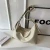 Bolso de hombro simple de moda para mujer 2023 nuevo nicho alta calidad correa de hombro ancha bandolera color liso bolso de axila