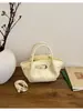 Bolso de cubo de moda súper popular transfronterizo para mujer 2026 nuevo bolso cruzado de moda bolso tote pequeño para el trabajo moderno