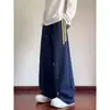 Calça Esportiva Casual Patchwork Listrada Corte Diagonal Estilo 2026 para Homens e Mulheres, Tendência Loose Fit Versátil para Casais, Perna Larga Reta