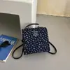 Mochila floral de moda estilo coreano, novo modelo de início de outono de 2026, bolsa de ombro grande capacidade personalizada de alta aparência para o dia a dia