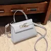 Bolso sencillo con textura de cocodrilo para mujer 2026 nuevo ins simple casual con cierre de hebilla bandolera para ir al trabajo bolso cuadrado pequeño