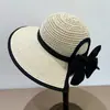 Sombrero de Sol de Paja Tejida Hueca de Verano para Mujer con Lazo Grande Protección Solar Ala Ancha Hace que la Cara Parezca Más Pequeña Plegable Sombrero de Viaje