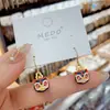 Novos Brincos de Orelha de Leão Esmaltados Elegantes Estilo Nacional Chinês Alta Sensação Temperamento Versátil Influenciador da Internet Gancho de Orelha Novos Brincos da Moda 2025