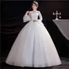 Vestido de Novia Elegante Estilo Bosque 2026 Nuevo Estilo Manga Larga Cuello en V con Encaje Sencillo y Diseño Largo hasta el Suelo