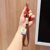 Llavero de cuerda trenzada de nailon de doble capa, cordón para teléfono móvil, correa para llaves de muñeco de peluche, accesorio colgante para bolso