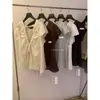 Liquidação, Sem Devoluções ou Trocas. Blusa Minimalista Estilo Coreano com Laço, Recorte nas Costas, Gola Redonda e Mangas Bufantes
