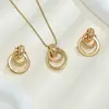 Moda Europea y Americana Uso Diario Elegante Versátil Metal Círculo Geométrico Conjunto de Joyería de Collar y Pendientes para Mujer