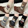 Calcetines de mujer de punto de hilo caricatura lindo oso calcetines de tubo otoño e invierno gruesos cálidos calcetines de lana nuevos calcetines