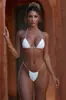 Venta al por mayor de fábrica Bikini de color liso Europeo y Americano de tres puntos Nuevo traje de baño para mujer con tiras bikini dividido sexy