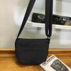 Bolsa Pequeña Mochila para Pareja para Hombre y Mujer 2025 Nueva Casual Coreana de Hombro Cruzada Moda Color Sólido Bolsa Pequeña para Estudiante