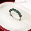 Comercio exterior transfronterizo nuevo diseño de moda europeo y americano nicho estilo de corte incrustado circonita colorida lujo anillo elegante