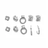 Pendientes plisados de flor redonda de metal de aguja plateada, de moda, sencillos, de lujo ligero, pendientes de alta gama, pendientes versátiles y exquisitos para mujer