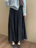 Saia plissada de cashmere grossa afunilada de cintura alta 2026 Outono/Inverno Novo estilo coreano versátil de grande evasê casual tipo guarda-chuva