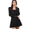 Comercio exterior ropa de mujer 2023 otoño moda coreana abrigo cruzado top temperamento falda corta plisada traje de dos piezas