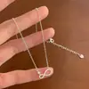 Colar S925 Prata de Lei Símbolo do Infinito Cravejado com Diamantes para Mulheres, Linhas Geométricas Simples, Design de Nicho, Corrente de Clavícula Versátil de Alta Qualidade