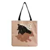 Directo de fábrica estilo coreano bolso de hombro práctico de dibujos animados moda versátil bolsa de mano lindo gato estampado bolsa de compras