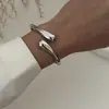 Diseño de Moda Transfronterizo Pulsera de Resorte Irregular Exagerada Ola Metal Ins Brillo Ancho Pulsera Moda